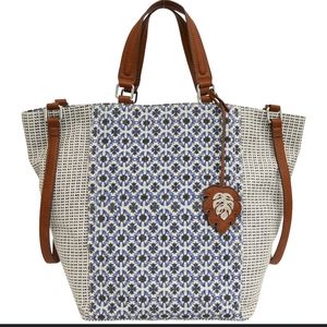 Tommy Bahama tote, leather handles, mint condition, used one time